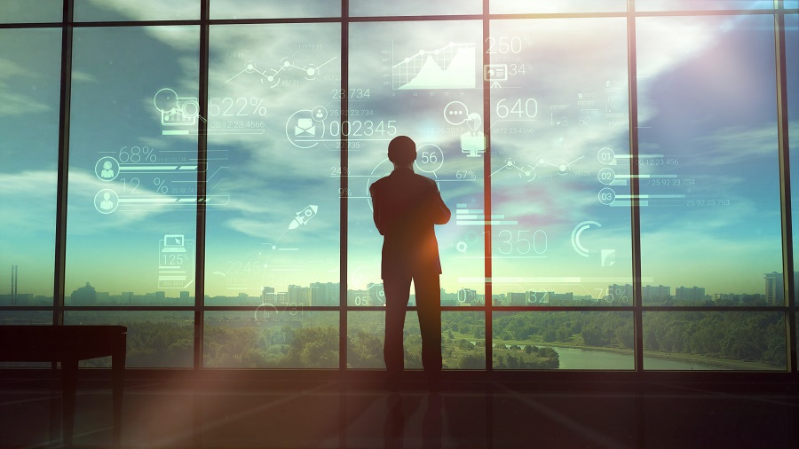 Silhouette of man and corporate infographics
