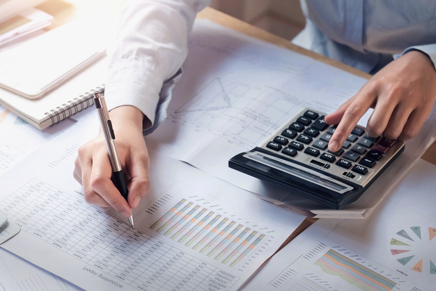 finance and accounting concept. business woman working on desk u